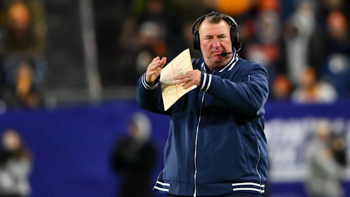 Dec 30, 2025; Nashville, TN, USA;  Illinois Fighting Illini head coach Bret Bielema calls time out against the Tennessee Volunteers during the second half at Nissan Stadium. Mandatory Credit: Steve Roberts-Imagn Images
