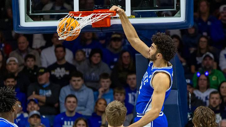 Feb 24, 2026; South Bend, Indiana, USA; Duke Blue Devils forward Cameron Boozer (12) dunks against the Notre Dame Fighting Irish.