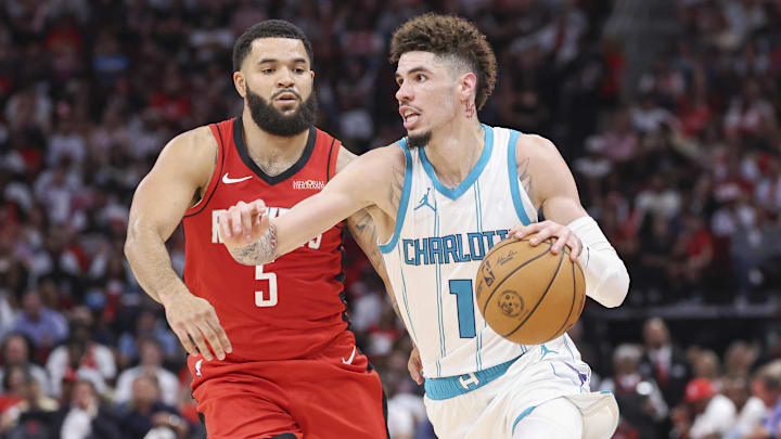 Oct 23, 2024; Houston, Texas, USA; Charlotte Hornets guard LaMelo Ball (1) drives with the ball as Houston Rockets guard Fred VanVleet (5) defends during the game at Toyota Center. Mandatory Credit: Troy Taormina-Imagn Images Oct 23, 2024; Houston, Texas, USA; Charlotte Hornets guard LaMelo Ball (1) drives with the ball as Houston Rockets guard Fred VanVleet (5) defends during the game at Toyota Center. Mandatory Credit: Troy Taormina-Imagn Images