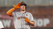 Jul 3, 2024; Cumberland, Georgia, USA; San Francisco Giants third baseman Matt Chapman (26) reacts at second base after hitting a double to drive in a run against the Atlanta Braves during the sixth inning at Truist Park.