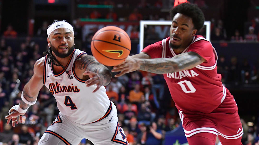 Feb 15, 2026; Champaign, Illinois, USA; Illinois Fighting Illini guard Kylan Boswell (4) and Indiana Hoosiers guard Jasai Miles (0) vie for a loose ball during the first half at State Farm Center. Mandatory Credit: Ron Johnson-Imagn Images Feb 15, 2026; Champaign, Illinois, USA; Illinois Fighting Illini guard Kylan Boswell (4) and Indiana Hoosiers guard Jasai Miles (0) vie for a loose ball during the first half at State Farm Center. Mandatory Credit: Ron Johnson-Imagn Images
