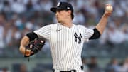 May 2, 2025; Bronx, New York, USA; New York Yankees starting pitcher Max Fried (54) delivers a pitch during the first inning against the Tampa Bay Rays during the first inning at Yankee Stadium.