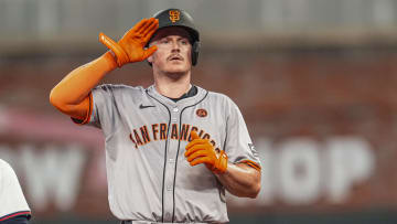 Jul 3, 2024; Cumberland, Georgia, USA; San Francisco Giants third baseman Matt Chapman (26) reacts at second base after hitting a double to drive in a run against the Atlanta Braves during the sixth inning at Truist Park. Mandatory Credit: Dale Zanine-USA TODAY Sports