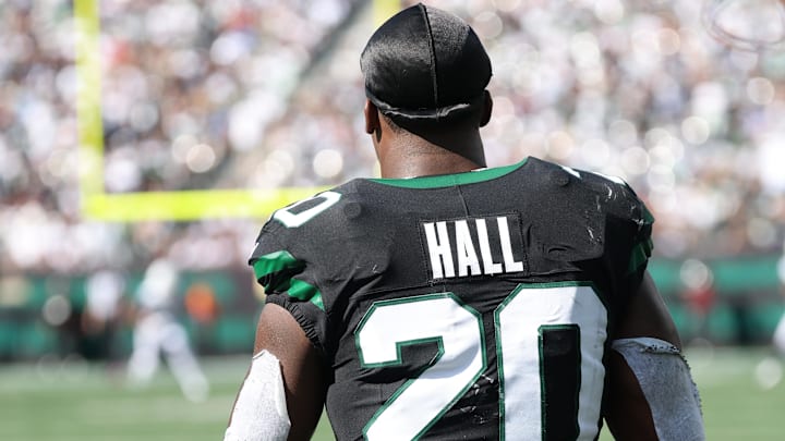 New York Jets running back Breece Hall (20) looks on from the sidelines after fumbling during the first half against the Dallas Cowboys at MetLife Stadium.