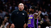 Jan 9, 2023; Denver, Colorado, USA; Los Angeles Lakers head coach Darvin Ham talks with guard Patrick Beverley (21) in the second quarter against the Denver Nuggets at Ball Arena. Mandatory Credit: Isaiah J. Downing-Imagn Images