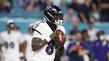 Oct 30, 2025; Miami Gardens, Florida, USA; Baltimore Ravens quarterback Lamar Jackson (8) looks to pass against the Miami Dolphins in the third quarter at Hard Rock Stadium. Mandatory Credit: Nathan Ray Seebeck-Imagn Images