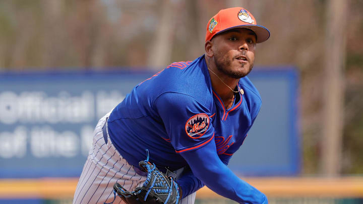Feb 17, 2026; Port St. Lucie, FL, USA;  New York Mets pitcher Freddy Peralta (51) throws a pitch during the New York Mets spring training workouts at Clover Park. Mandatory Credit: Reinhold Matay-Imagn Images