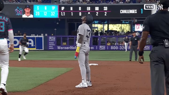 Jazz Chisholm Jr. was out after he didn't get back to first base on a fly ball to the infield