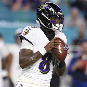 Oct 30, 2025; Miami Gardens, Florida, USA; Baltimore Ravens quarterback Lamar Jackson (8) looks to pass against the Miami Dolphins in the third quarter at Hard Rock Stadium. Mandatory Credit: Nathan Ray Seebeck-Imagn Images