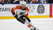 Jan 5, 2025; Toronto, Ontario, CAN; Philadelphia Flyers forward Scott Laughton (21) carries the puck against the Toronto Maple Leafs during the second period at Scotiabank Arena. Mandatory Credit: John E. Sokolowski-Imagn Images