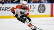 Jan 5, 2025; Toronto, Ontario, CAN; Philadelphia Flyers forward Scott Laughton (21) carries the puck against the Toronto Maple Leafs during the second period at Scotiabank Arena. Mandatory Credit: John E. Sokolowski-Imagn Images