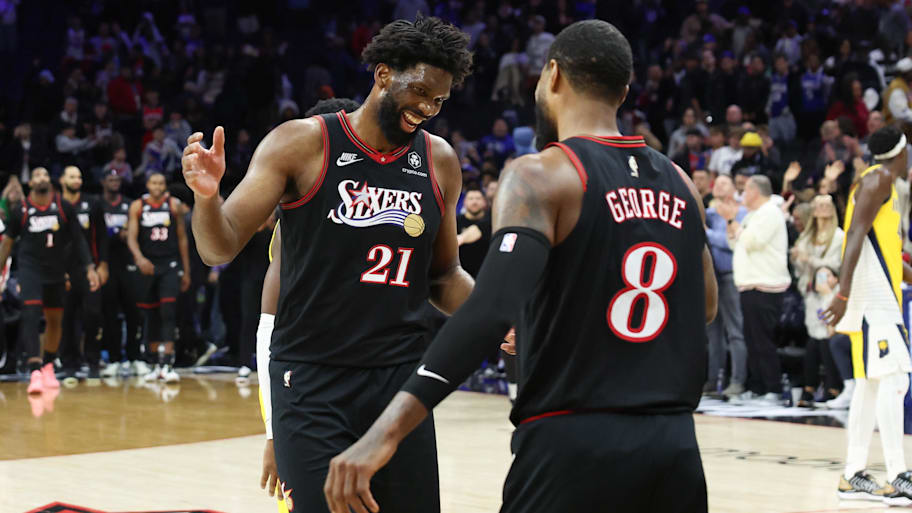 Paul George and Joel Embii