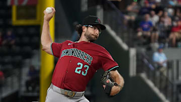 Aug 13, 2025; Arlington, Texas, USA; Arizona Diamondbacks starting pitcher Zac Gallen (23) throws to the plate during the second inning against the Texas Rangers at Globe Life Field. Mandatory Credit: Raymond Carlin III-Imagn Images