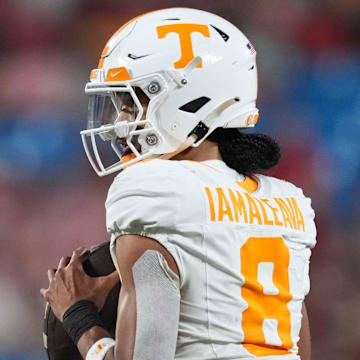 Tennessee quarterback Nico Iamaleava (8) looks to pass at the NCAA College football game between Tennessee and NC State on Saturday, Sept. 7, 2024 in Charlotte, NC.