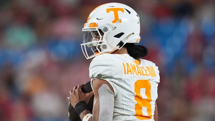 Tennessee quarterback Nico Iamaleava (8) looks to pass at the NCAA College football game between Tennessee and NC State on Saturday, Sept. 7, 2024 in Charlotte, NC.