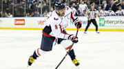 Oct 12, 2025; New York, New York, USA;  Washington Capitals left wing Alex Ovechkin (8) attempts a shot on goal in the first period against the New York Rangers at Madison Square Garden. Mandatory Credit: Wendell Cruz-Imagn Images