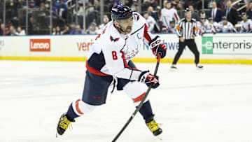 Oct 12, 2025; New York, New York, USA;  Washington Capitals left wing Alex Ovechkin (8) attempts a shot on goal in the first period against the New York Rangers at Madison Square Garden. Mandatory Credit: Wendell Cruz-Imagn Images