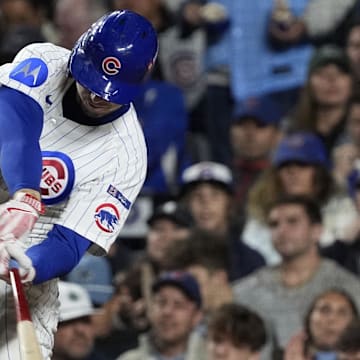Oct 9, 2025; Chicago, Illinois, USA; Chicago Cubs right fielder Kyle Tucker (30) hits a home run against the Milwaukee Brewers during the seventh inning for game four of the NLDS round for the 2025 MLB playoffs at Wrigley Field. Mandatory Credit: David Banks-Imagn Images