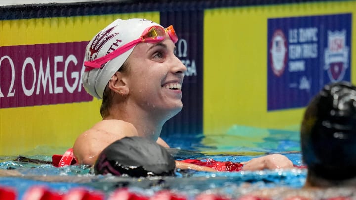 Regan Smith reacts after winning the 100-meter backstroke final while setting a world record Tuesday, June 18, 2024, during the fourth day of competition for the U.S. Olympic Team Swimming Trials 