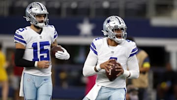 Aug 26, 2022; Arlington, Texas, USA;  Dallas Cowboys quarterback Dak Prescott (4) and quarterback Will Grier (15) throw passes during warmups before the game against the Seattle Seahawks at AT&T Stadium. Mandatory Credit: Tim Heitman-Imagn Images