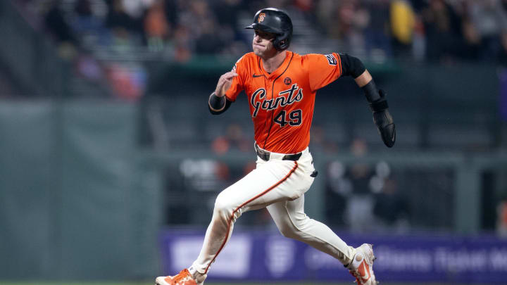 Aug 9, 2024; San Francisco, California, USA; San Francisco Giants shortstop Tyler Fitzgerald (49) goes from first to third on a single by Heliot Ramos during the seventh inning against the Detroit Tigers at Oracle Park. 