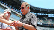 Chicago White Sox owner Jerry Reinsdorf signs autographs prior to ceremonies to commemorate the 10th anniversary of the 2005 World Series championship before a game against the Kansas City Royals at U.S Cellular Field in 2015.