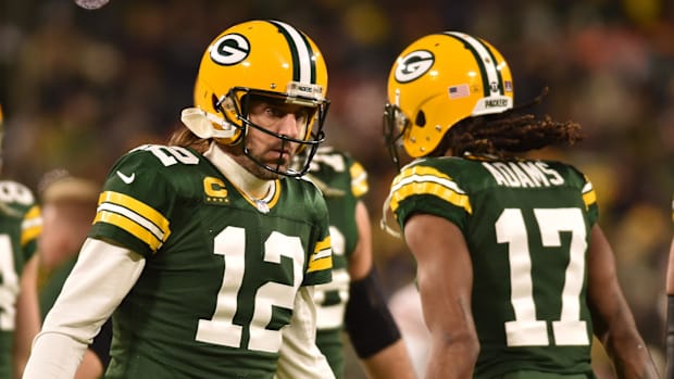 Green Bay Packers quarterback Aaron Rodgers (12) and wide receiver Davante Adams