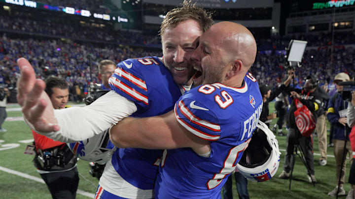 Bills Matt Prater gets hugged by Buffalo Bills long snapper Reid Ferguson after the game. Prater’s field goal put the Bills ahead 41-40 to win their game against he Baltimore Ravens at Highmark Stadium in Orchard Park on Sept. 7, 2025.