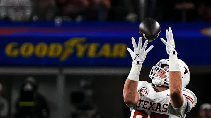 Texas Longhorns tight end Gunnar Helm (85) makes a catch during the College Football Playoff semifinal game against Ohio State in the Cotton Bowl at AT&T Stadium on Friday, Jan. 10, 2024 in Arlington, Texas. Texas Longhorns tight end Gunnar Helm (85) makes a catch during the College Football Playoff semifinal game against Ohio State in the Cotton Bowl at AT&T Stadium on Friday, Jan. 10, 2024 in Arlington, Texas.