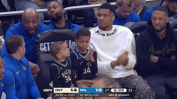 Bucks star Antetokounmpo sits with his sons on the Milwaukee bench during final game of the regular season Bucks star Antetokounmpo sits with his sons on the Milwaukee bench during final game of the regular season