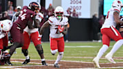 Nov 1, 2025; Blacksburg, Virginia, USA;  Louisville Cardinals running back Keyjuan Brown (22) runs the ball against the Virginia Tech Hokies during the fourth quarter at Lane Stadium. Mandatory Credit: Brian Bishop-Imagn Images