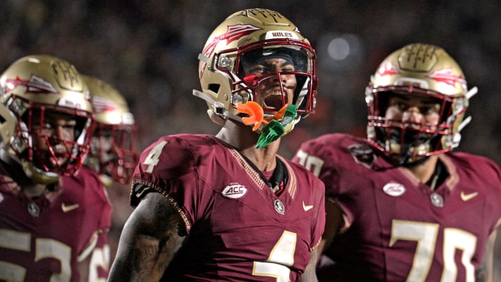 Nov 11, 2023; Tallahassee, Florida, USA; Florida State Seminoles wide receiver Keon Coleman (4) celebrates a touchdown score against the Miami Hurricanes during the second half at Doak S. Campbell Stadium. Mandatory Credit: Melina Myers-USA TODAY Sports