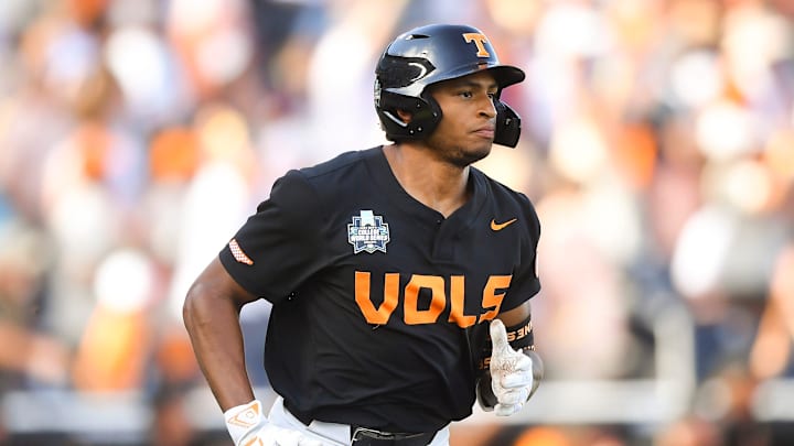 Tennessee's Christian Moore (1) runs the bases after hitting a home run during game three of the NCAA College World Series finals between Tennessee and Texas A&M at Charles Schwab Field in Omaha, Neb., on Monday, June 24, 2024.