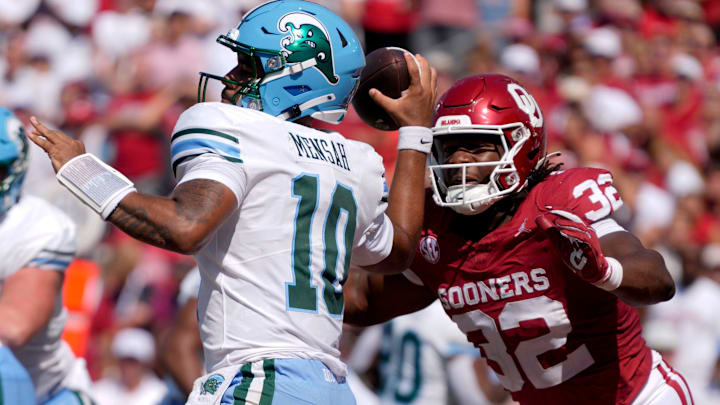 Oklahoma Sooners defensive lineman R Mason Thomas (32) pressures Tulane Green Wave quarterback Darian Mensah (10) during a college football game between the University of Oklahoma Sooners (OU) and the Tulane Green Wave at Gaylord Family - Oklahoma Memorial Stadium in Norman, Okla., Saturday, Sept. 14, 2024.