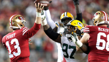 Green Bay Packers defensive tackle Kenny Clark (97) pressures San Francisco 49ers quarterback Brock Purdy (13) in the third quarter during their NFC divisional playoff football game Saturday, January 20, 2024, at Levi's Stadium in Santa Clara, California.