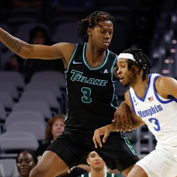 Mar 15, 2025; Fort Worth, TX, USA; Memphis Tigers guard Colby Rogers (3) controls the ball as Tulane Green Wave guard Kam Williams (3) defends during the first half at Dickies Arena. Mandatory Credit: Chris Jones-Imagn Images
