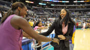 Aug 9, 2010; Los Angeles, CA, USA; Los Angeles Sparks player Candace Parker (right) congratulates former player Lisa Leslie (left).