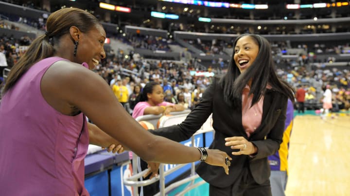 Aug 9, 2010; Los Angeles, CA, USA; Los Angeles Sparks player Candace Parker (right) congratulates former player Lisa Leslie (left).