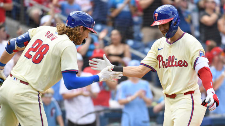 Aug 18, 2024; Philadelphia, Pennsylvania, USA; Philadelphia Phillies shortstop Trea Turner (7) celebrates his home run with third base Alec Bohm (28).