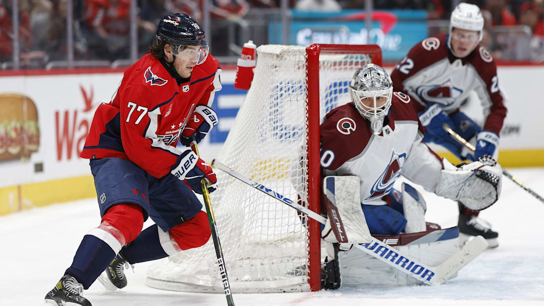 Feb 13, 2024; Washington, District of Columbia, USA; Washington Capitals right wing T.J. Oshie (77) skates in on Colorado Avalanche goaltender Alexandar Georgiev (40) in the third period at Capital One Arena. Mandatory Credit: Geoff Burke-Imagn Images Feb 13, 2024; Washington, District of Columbia, USA; Washington Capitals right wing T.J. Oshie (77) skates in on Colorado Avalanche goaltender Alexandar Georgiev (40) in the third period at Capital One Arena. Mandatory Credit: Geoff Burke-Imagn Images