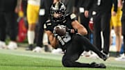 Purdue Boilermakers wide receiver EJ Horton Jr. (13) slides for a catch