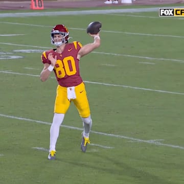 USC quarterback Sam Huard completed a pass on a sly fake punt