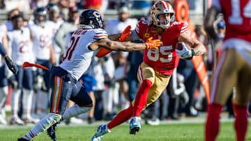Dec 8, 2024; Santa Clara, California, USA; San Francisco 49ers tight end George Kittle (85) catches a long pass during the first quarter against the Chicago Bears at Levi's Stadium. Mandatory Credit: Bob Kupbens-Imagn Images