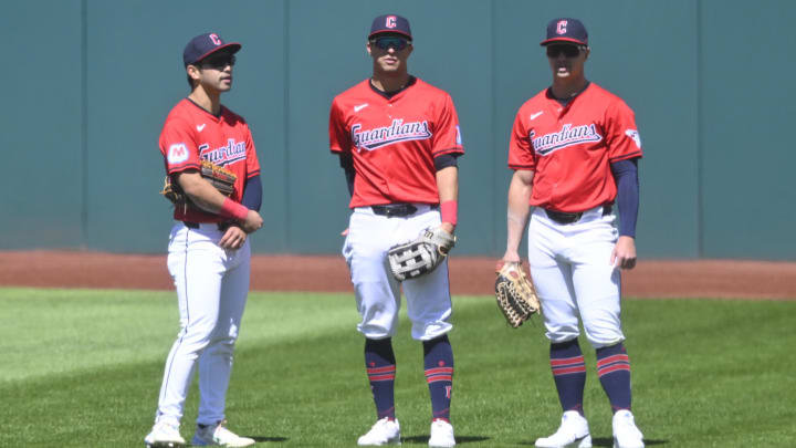 Apr 13, 2024; Cleveland, Ohio, USA; Cleveland Guardians outfielder Steven Kwan (38), outfielder Tyler Freeman (2) and outfielder Will Brennan (17) stand on the field in the fifth inning against the New York Yankees at Progressive Field. Mandatory Credit: David Richard-USA TODAY Sports