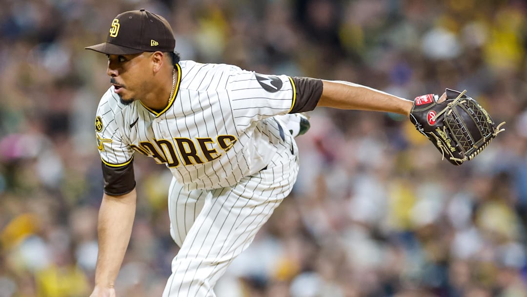 Jeremiah Estrada (56) throws a pitch during the eighth inning against the Detroit Tigers at Petco Park. Jeremiah Estrada (56) throws a pitch during the eighth inning against the Detroit Tigers at Petco Park.