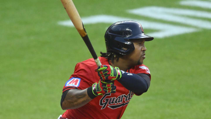 Jul 23, 2024; Cleveland, Ohio, USA; Cleveland Guardians third baseman Jose Ramirez (11) hits an RBI single in the sixth inning against the Detroit Tigers at Progressive Field. Mandatory Credit: David Richard-USA TODAY Sports