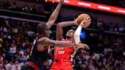 Oct 23, 2024; New Orleans, Louisiana, USA;  New Orleans Pelicans guard Dejounte Murray (5) shoots a jump shot against Chicago Bulls forward Jalen Smith (7) during the second half at Smoothie King Center. Mandatory Credit: Stephen Lew-Imagn Images