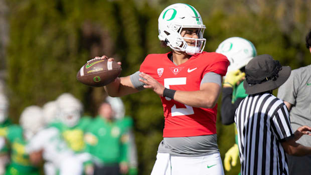 Oregon quarterback Dante Moore throws during practice with the Oregon Ducks Tuesday, April 16, 2024 at the Hatfield-Dowlin Co