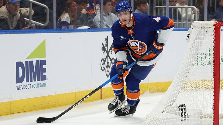 Jan 3, 2026; Elmont, New York, USA; New York Islanders defenseman Cole McWard (4) skates with the puck against the Toronto Maple Leafs during the third period at UBS Arena. Jan 3, 2026; Elmont, New York, USA; New York Islanders defenseman Cole McWard (4) skates with the puck against the Toronto Maple Leafs during the third period at UBS Arena.