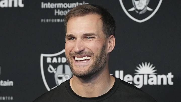 Las Vegas Raiders quarterback Kirk Cousins speaks at a press conference.